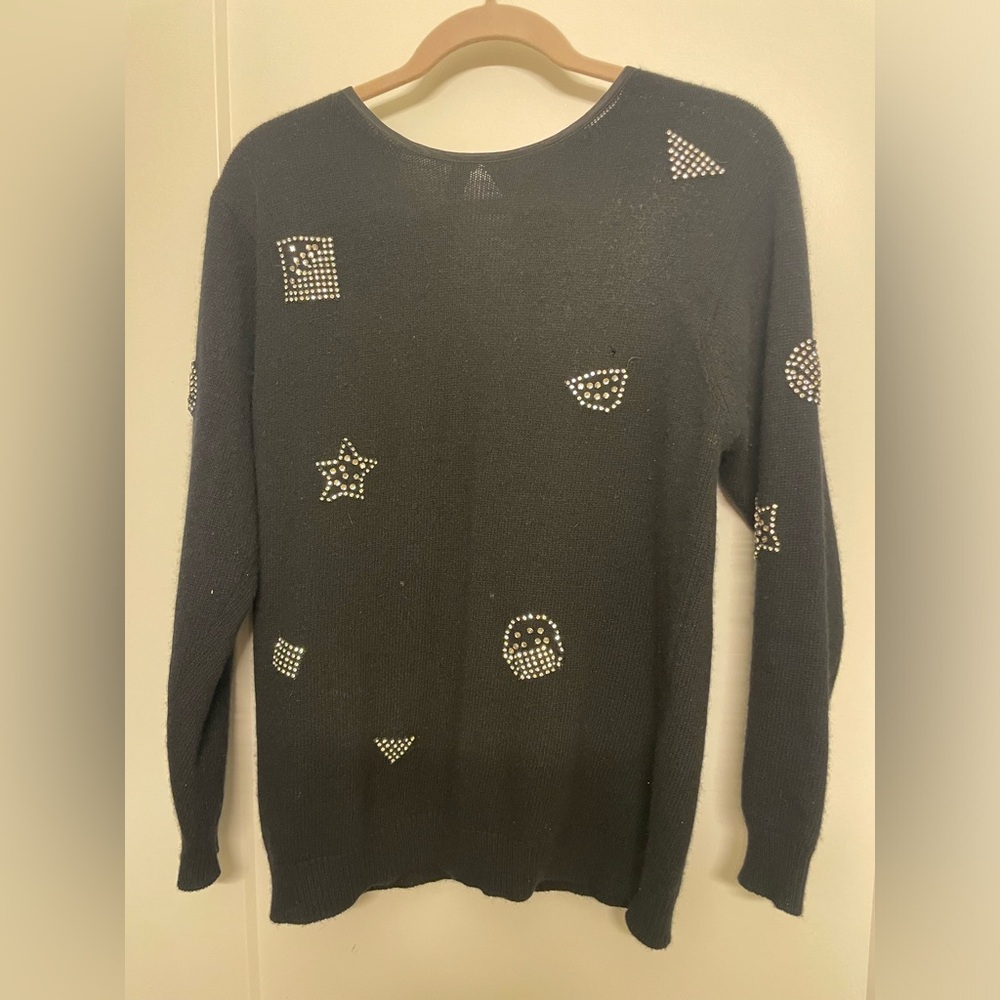 Black sweater with rhinestone designs